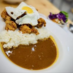 Demiya - Chicken karaage curry rice +1 heat +sunny side up egg +pickles (not shown) +side salad - excellent meal