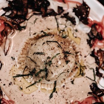 Restaurant IRON - Chicken and house made ricotta ravioli. Sherried mushroom creme sauce, truffle oil, cremini mushrooms, and pickled fennel. - Southern Near Me - Pensacola, Florida