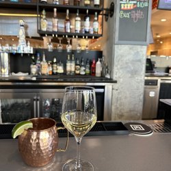 Stage 71 - Moscow mule and glass of Pinot Grigio