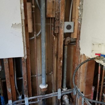 MBG Solutions - a hole in the wall of a bathroom - Damage Restoration Near Me MBG Solutions - a hole in the wall of a bathroom - Damage Restoration Near Me