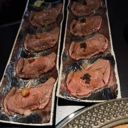 Fois gras A5 Wagyu nigiri on the left, caviar nigiri on the right Fois gras A5 Wagyu nigiri on the left, caviar nigiri on the right