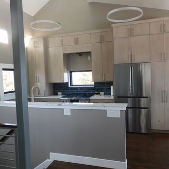 Metro Reconstruction Services - a modern kitchen with stainless steel appliances - General Contractors Near Me - Boulder, Colorado