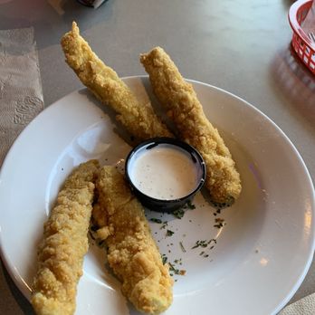 Pluckers Wing Bar - Round Rock - Fried pickle spears, we got six, but we both ate one before I had a chance to take the picture - American Near Me - Round Rock, Texas
