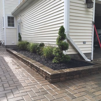 Andy's Lawn & Landscape - Freshly tamped and re-set bricks - Landscaping Near Me - Saint Clair, Michigan Andy's Lawn & Landscape - Freshly tamped and re-set bricks - Landscaping Near Me - Saint Clair, Michigan