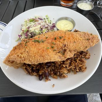 Zeke's Restaurant - Fried grouper with rice and dirty rice - Salad Near Me - Orange Beach, Alabama Zeke's Restaurant - Fried grouper with rice and dirty rice - Salad Near Me - Orange Beach, Alabama