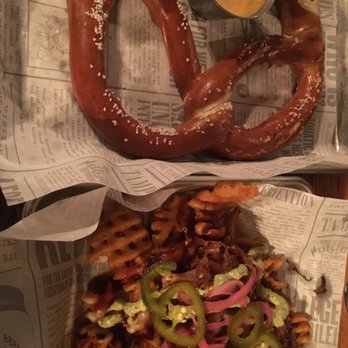 Coppertail Brewing Co - beer cheese Pretzel and loaded fries - Bars Near Me - Tampa, Florida