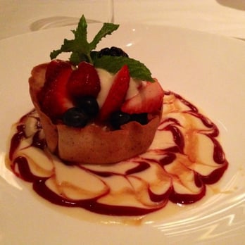 Le Papillon - Fresh berries corbeille in an almond cookie cup with Grand Marnier cream - French Near Me - San Jose, California