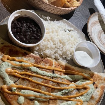 Little Tijuana - Quesadilla with rice and beans - Lounges Near Me - Newark, New Jersey Little Tijuana - Quesadilla with rice and beans - Lounges Near Me - Newark, New Jersey