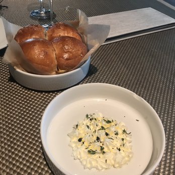 The Grove - Bread and seasoned rosemary and thyme butter - New American Near Me - Houston, Texas The Grove - Bread and seasoned rosemary and thyme butter - New American Near Me - Houston, Texas