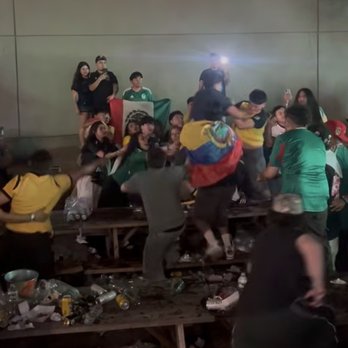 Pig Beach BBQ - People fighting on tables before throwing glass bottles and cans and metal buckets for ice. - Barbeque Near Me - Astoria, New York