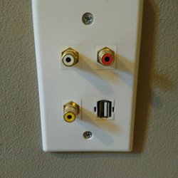 Jupiter Electric - We flush-mounted the TV but still need access to plug in our old-school gaming system. He put in a special plug by the other outlet.