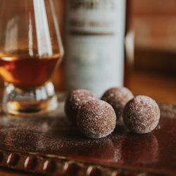 Bootleg Bourbon Balls - Dame's Dish - Dark chocolate with a whiskey-soaked maraschino cherry tucked inside!