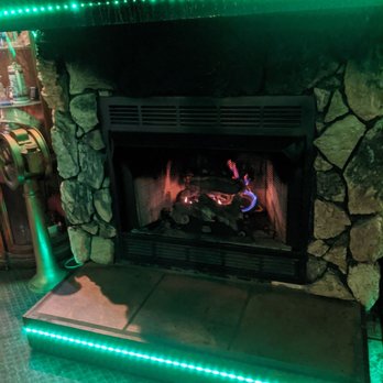 The Baltimore House - a fireplace with green lights - Seafood Near Me - Pleasant Hills, Pennsylvania The Baltimore House - a fireplace with green lights - Seafood Near Me - Pleasant Hills, Pennsylvania