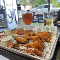 Javi's Taco Shack - Wings, half spicy Asian , half buffalo. Spicy white claw.
