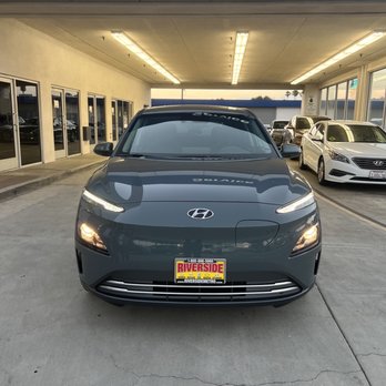 Riverside Hyundai - Front view of the Hyundai Kona EV SEL in Cactus Fern - Auto Parts & Supplies Near Me - Riverside, California Riverside Hyundai - Front view of the Hyundai Kona EV SEL in Cactus Fern - Auto Parts & Supplies Near Me - Riverside, California