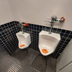 Cook's Buffet Cafe and Bakery - Men's restroom