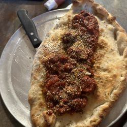 Ma Famiglia - A massive calzone and it was delicious. The marinara is absolutely homemade.