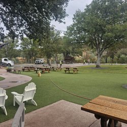 Santanas Cottage Cafe and Catering - Lawn area and dining area.