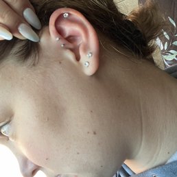 2 forward helix piercings