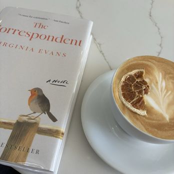 Jaffa Coffee Roasters - Reading a book and enjoying a jaffa latte. - Coffee & Tea Near Me - Berkeley, California