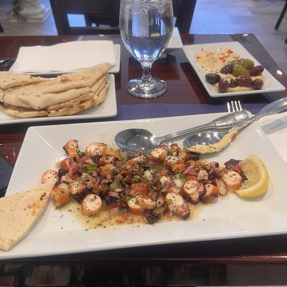 That calamari made me talk about it all night. The only downfall was serving me olives with seeds. There is no cute way to spit at a table. That calamari made me talk about it all night. The only downfall was serving me olives with seeds. There is no cute way to spit at a table.