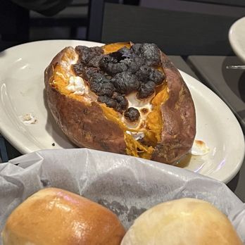 Texas Roadhouse - Sweet Potato with burned marshmallows. It was inedible. Toppings had to be scraped off. Shouldn't have been presented to a customer? - Steakhouses Near Me - Cartersville, Georgia