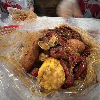 Raising Claw - the bucket: crawfish, clams, potatoes, corn, sausage - Seafood Near Me - Garden Grove, California Raising Claw - the bucket: crawfish, clams, potatoes, corn, sausage - Seafood Near Me - Garden Grove, California
