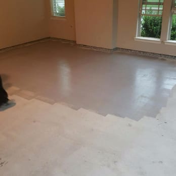 Diamond Cut Garage Floors - Part of the floor with the epoxy primer. - Flooring Near Me