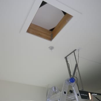 Solid Home Inspections - New house garage attic access missing fire-rated hatch. - Home Inspectors Near Me Solid Home Inspections - New house garage attic access missing fire-rated hatch. - Home Inspectors Near Me