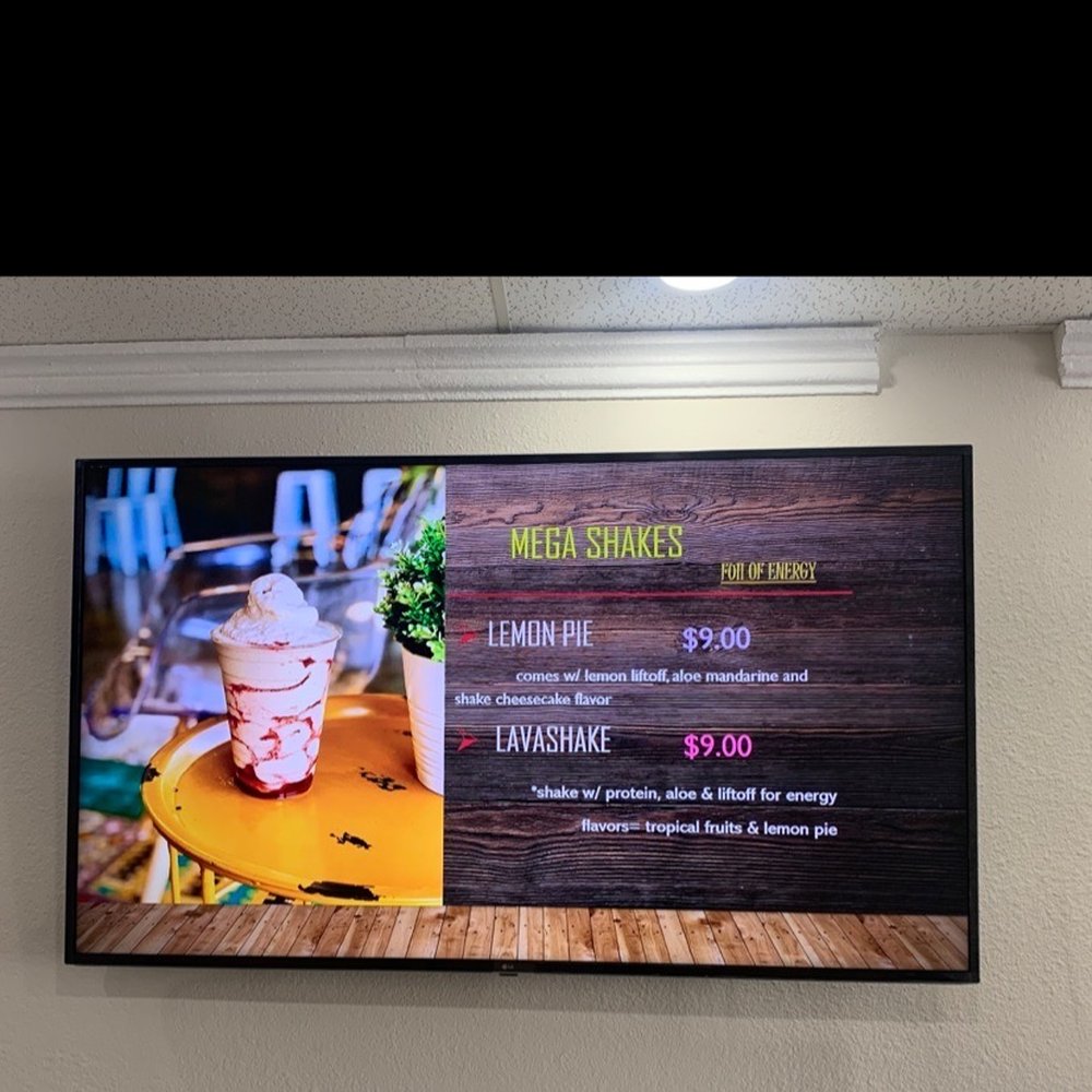 Hello Life - a menu displayed on a wall - Juice Bars & Smoothies Near Me - El Paso, Texas
