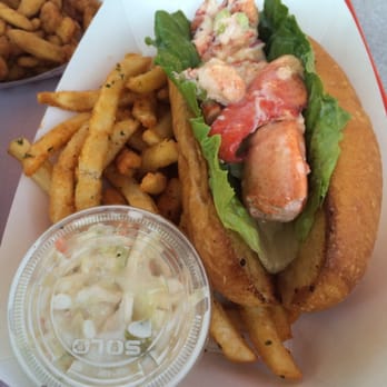 Claws - Lobster roll served with seasoned fries - Seafood Near Me - West Sayville, New York Claws - Lobster roll served with seasoned fries - Seafood Near Me - West Sayville, New York
