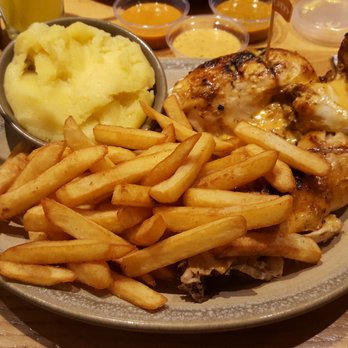Nando's - 1/2 Chicken with Chips and Creamy Mash - Fast Food Near Me - London, XGL Nando's - 1/2 Chicken with Chips and Creamy Mash - Fast Food Near Me - London, XGL