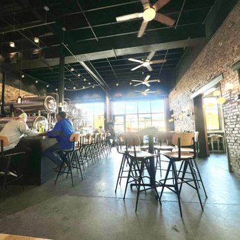 Hello Monty - Bar and brewery area with additional seating area and outdoor patio to right - New American Near Me - Chattanooga, Tennessee Hello Monty - Bar and brewery area with additional seating area and outdoor patio to right - New American Near Me - Chattanooga, Tennessee