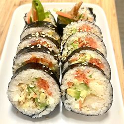 K Bop Korean Fusion Cafe - Kimbap - classic Korean rice rolls filled with seasoned vegetables and savory ingredients. A popular Korean street-food favorite at K Bop in