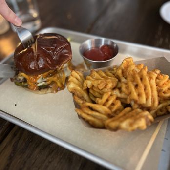 Emily - Double Cheeseburger on Pretzel Bun and Waffle fries - Pizza Near Me - New York, New York Emily - Double Cheeseburger on Pretzel Bun and Waffle fries - Pizza Near Me - New York, New York
