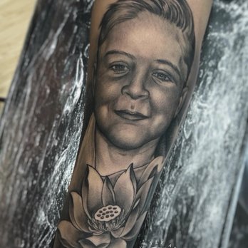 Yonkos Tattoo Studio - Portrait and lotus done by hustleart - Tattoo Near Me - San Jose, California Yonkos Tattoo Studio - Portrait and lotus done by hustleart - Tattoo Near Me - San Jose, California