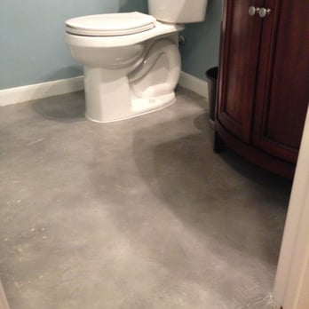 Applied Concrete Solutions - Half bathroom (was ceramic tile, now industrial gray) - Flooring Near Me - Cedar Park, Texas
