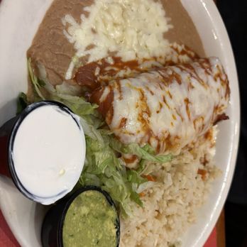 Manuel's Mexican Restaurant - My friends plate .. chimichanga w/ enchilada sauce - Mexican Near Me - Green Valley, Arizona