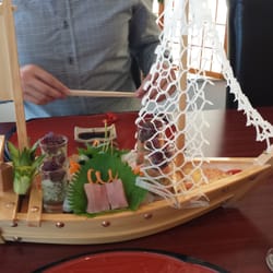 Take Mikado - Sashimi boat. Beautiful and delicious.