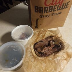 Brisket,collard greens and hush puppies. I had to throw out the other foods.