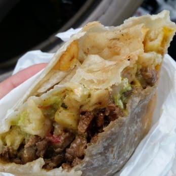 La Posta De Acapulco - Bottom half of my CA burrito-- it comes with guac! So exciting! - Mexican Near Me - Spring Valley, California La Posta De Acapulco - Bottom half of my CA burrito-- it comes with guac! So exciting! - Mexican Near Me - Spring Valley, California