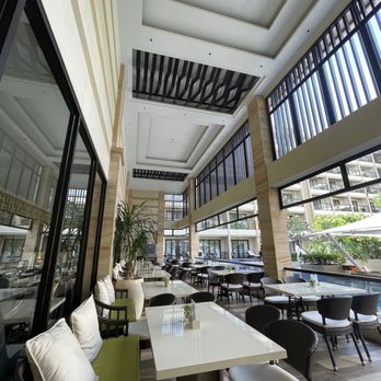 Henann Park Resort - Outside seating for the hotel's restaurant (there is also indoor seating available during breakfast) - Resorts Near Me - Malay, AKL