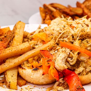 Shay's Wave - a plate with a sandwich and french fries - Food Trucks Near Me Shay's Wave - a plate with a sandwich and french fries - Food Trucks Near Me