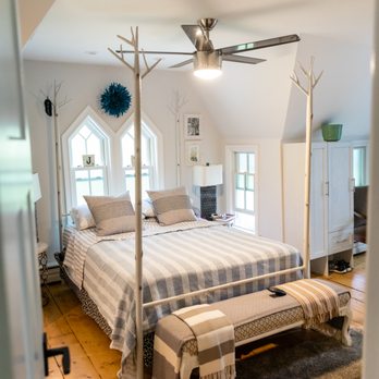 Golden Eye Construction - a bedroom with a four poster bed - General Contractors Near Me Golden Eye Construction - a bedroom with a four poster bed - General Contractors Near Me