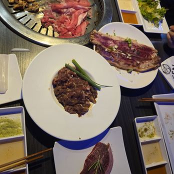 Gen Korean BBQ House - Bulgogi, sirloin steak, pork ribs, and on the grill is brisket and garlic chicken. - Korean Near Me - Alhambra, California Gen Korean BBQ House - Bulgogi, sirloin steak, pork ribs, and on the grill is brisket and garlic chicken. - Korean Near Me - Alhambra, California