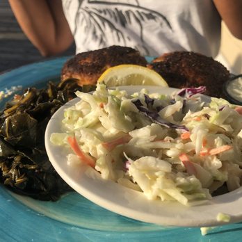 Skippers Pier - Blacken crab cakes, collard, and coke slaw - Seafood Near Me - Deale, Maryland Skippers Pier - Blacken crab cakes, collard, and coke slaw - Seafood Near Me - Deale, Maryland