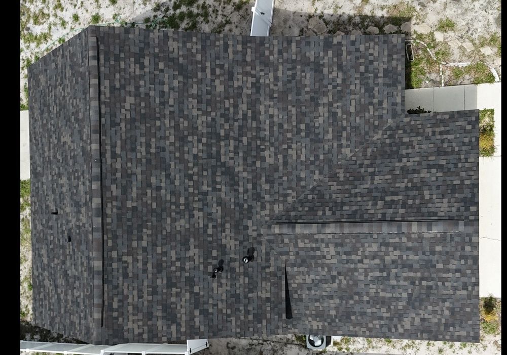 Slide of Shingle Masters Roofing & Construction Services