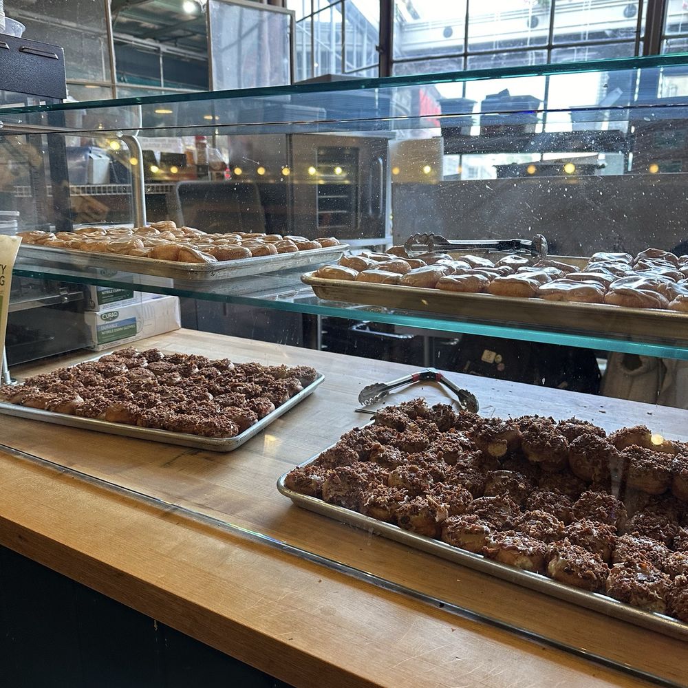 Daily Dozen Doughnut - Donuts (Maple Bacon on bottom right) - Bakeries Near Me - Seattle, Washington Daily Dozen Doughnut - Donuts (Maple Bacon on bottom right) - Bakeries Near Me - Seattle, Washington