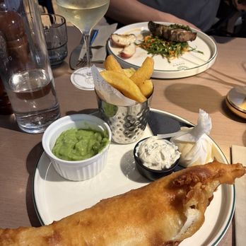 Darwin Brasserie - Front: Fish and chip, Back: Grilled pork chop - Brasseries Near Me - London, XGL