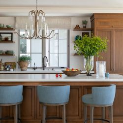 McKee & Company - Custom kitchen design in Newport Beach featuring warm wood cabinetry, layered textures, and timeless finishes by McKee & Co.